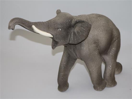 A Sevres Vinsare model of a trumpeting elephant, L.18in.
